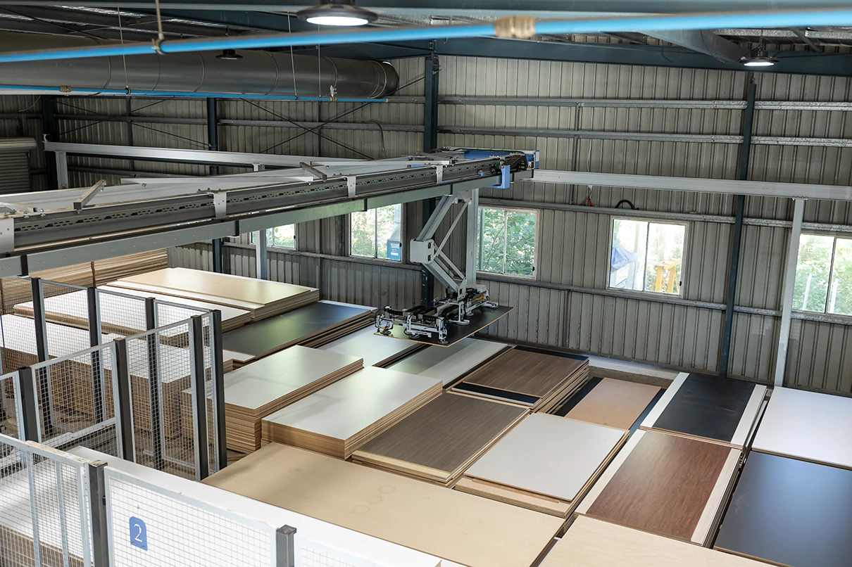 Automated material handling for CNC nesting cells